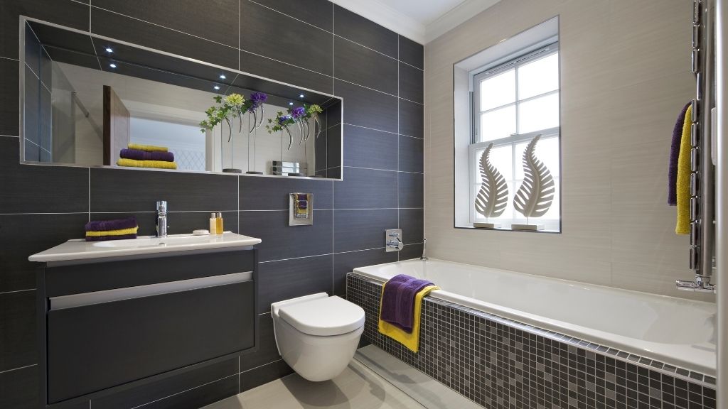 New black tiling installed on a bathroom wall in Bradenton, FL