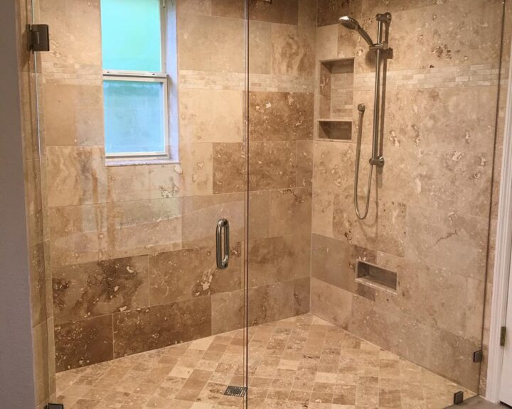 A bathroom with a glass shower door is ideal for a modern bathroom remodel.