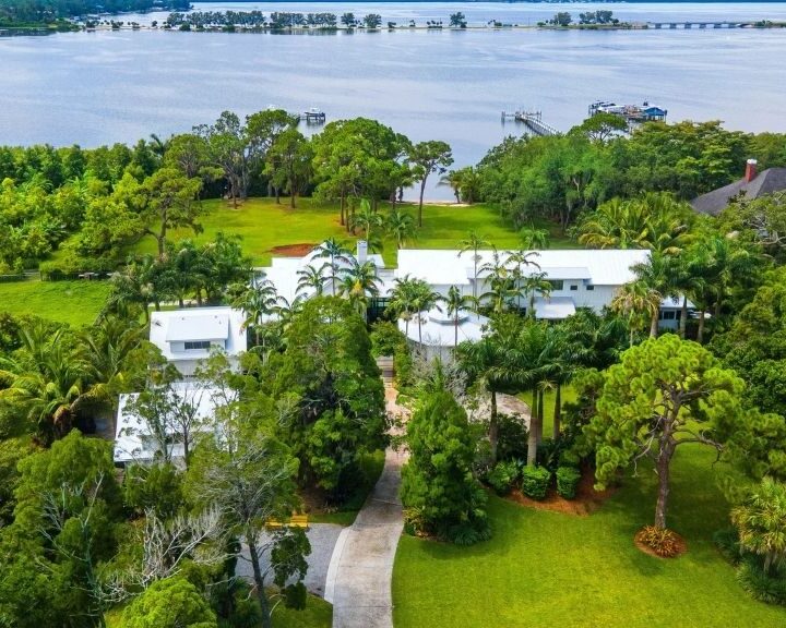 Aerial view of a waterfront home with a bathroom remodel.