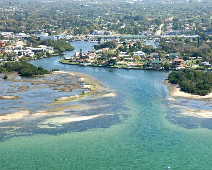 An aerial view of a city and river.